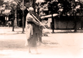 Ajahn Chah sweeping